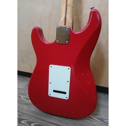 136 - A Fender Stratocaster Mexican electric guitar, red body with white pick guard, maple neck, made in M... 