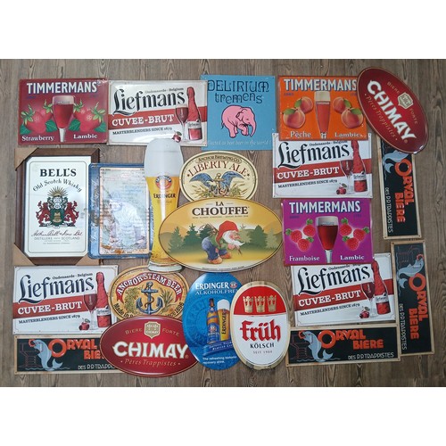 117 - A collection of mainly metal (one plastic) beer signs including Belgian and a similar mirror, rangin... 