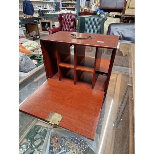 41 - A 19th century rosewood sewing box together with an early 20th century mahogany cabinet having drop ... 