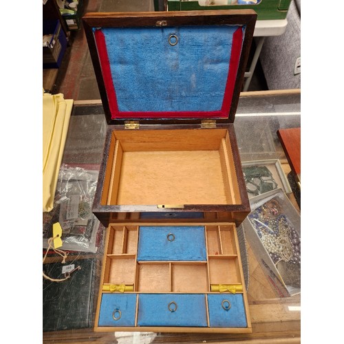 41 - A 19th century rosewood sewing box together with an early 20th century mahogany cabinet having drop ... 