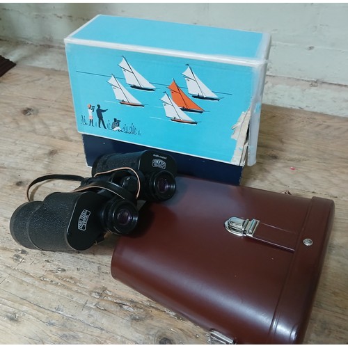 153 - A pair of Carl Zeiss Jena Jenoptem 10x50W binoculars with leather case and original box, appear unus... 