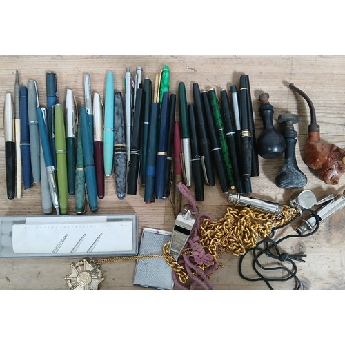 193 - Assorted collectables comprising mainly vintage pens, two seals, a pipe modelled as a bull's head, w... 