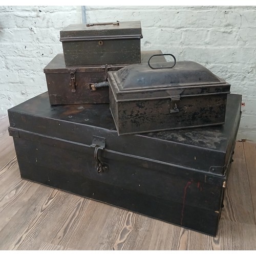 86 - A group of four vintage metal boxes.