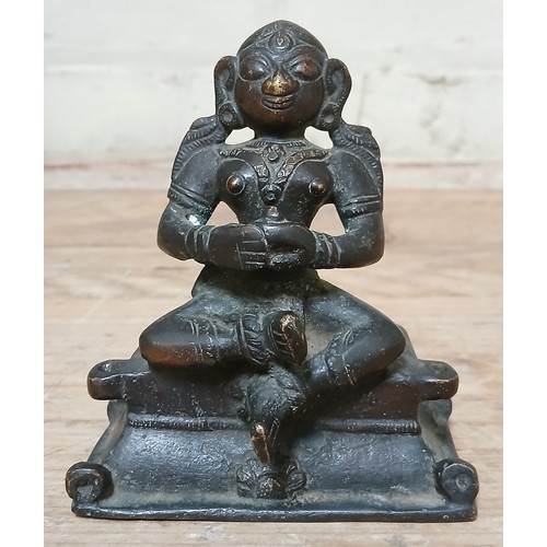 91 - A small bronze Indian goddess diety statue, possibly 19th century, height 12.5cm.