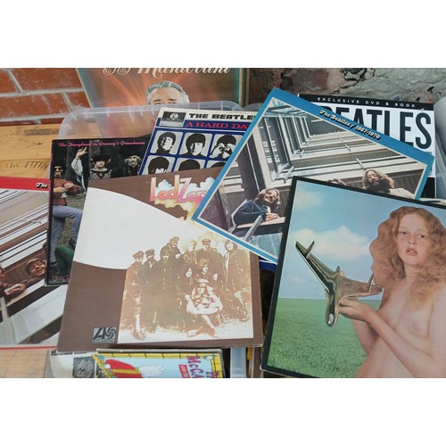 373 - Two boxes of records, a small number of rock and pop LPs including Blind Faith, The Beatles, Led Zep... 