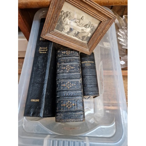 44 - Two 19th century bibles and one other, together with a framed religious picture.