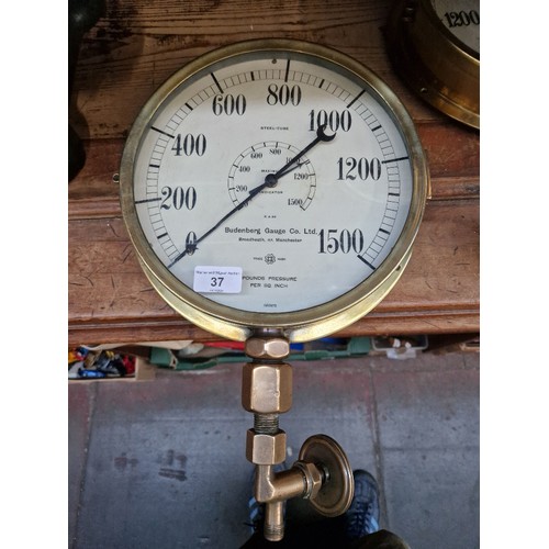 37 - A large brass hydraulic pressure gauge, the dial signed 'Budenberg Gauge Co Ltd, Broad Heath Nr Manc... 