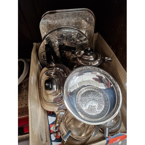 54 - A box of silver plated ware including tea set, posy, footed dish, etc.