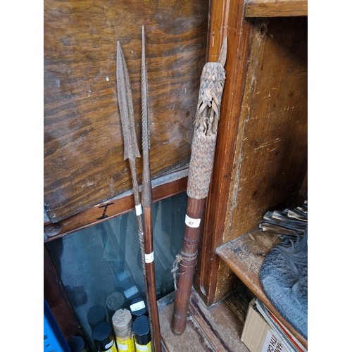 47 - Two African spears and a quiver of arrows, brought back from Africa by the vendor's father in the mi... 