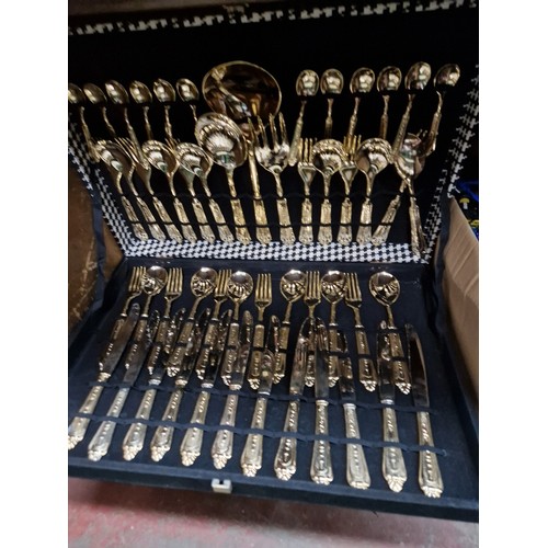 69 - A canteen of gold plated cutlery