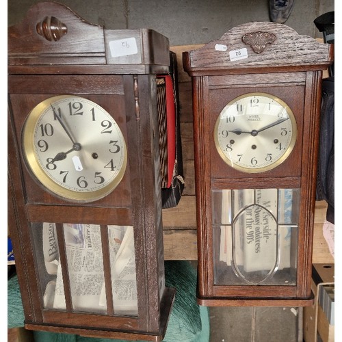 92 - 2 wall clocks, one by Wise of Bootle