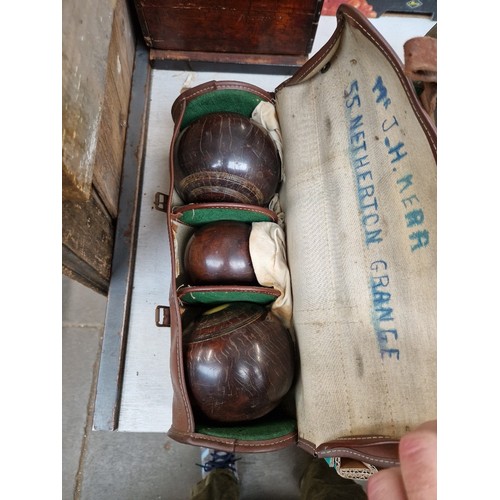 107 - A set of lignum vitae bowls, bias 2 full, no maker's name. Number BB175H