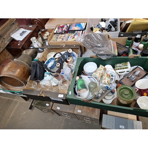 106 - Four boxes of pottery and metalware to include brass, Coalport, glass ware, commemorative crowns, pl... 