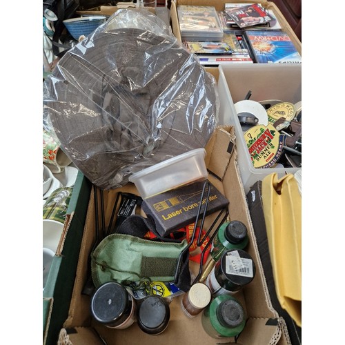 105 - A box of shooting accessories including cleaners, laser bore sight, digital calliper, compass etc