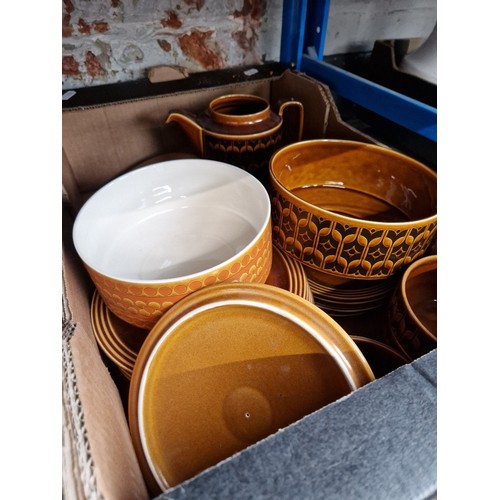 132 - A box of Hornsea pottery including teapot, plates, bowls, lidded bowls, etc.