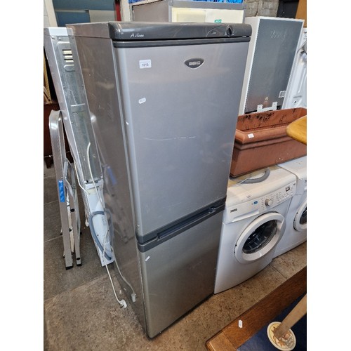 1016 - A grey Beko fridge freezer (3 drawer)