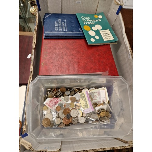 147 - A box of UK and World coins, banknotes and accessories.