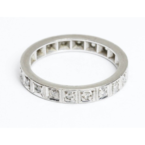 176 - A mid 20th century white metal diamond eternity ring, twenty single cut stones weighing approximatel... 