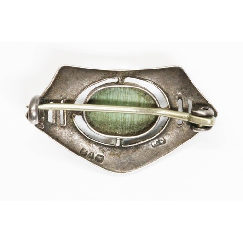 199 - A Charles Horner Arts & Crafts style silver brooch set with a green cabochon, length 25mm