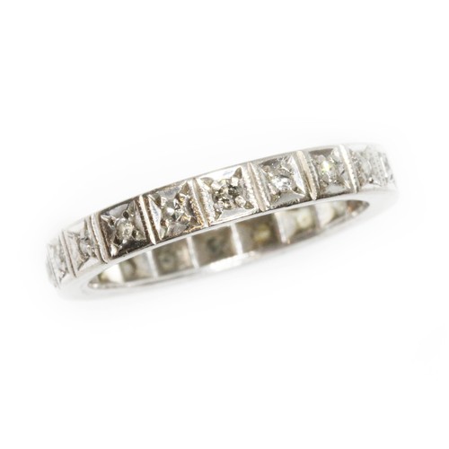 176 - A mid 20th century white metal diamond eternity ring, twenty single cut stones weighing approximatel... 