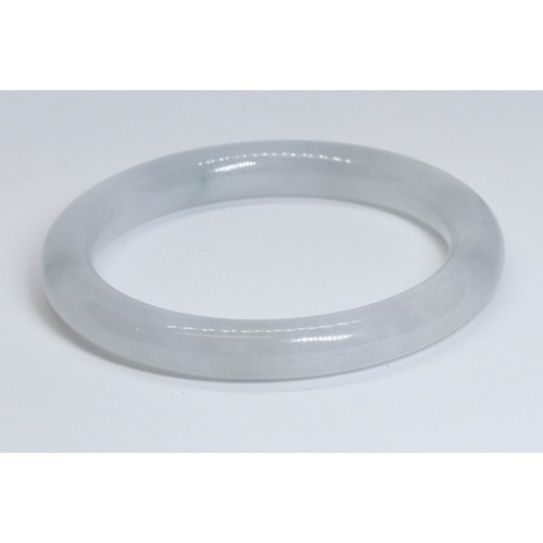 185 - A Chinese icy jadeite jade bangle, inner diameter 55mm, outer diameter 74mm, gross weight 44.4g.