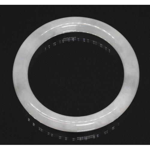 185 - A Chinese icy jadeite jade bangle, inner diameter 55mm, outer diameter 74mm, gross weight 44.4g.