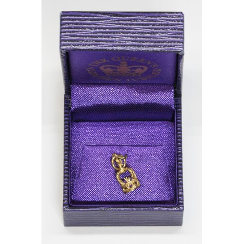 182 - A Queens Golden Jubilee 2002 9ct gold charm, weight 1.1g, with box.