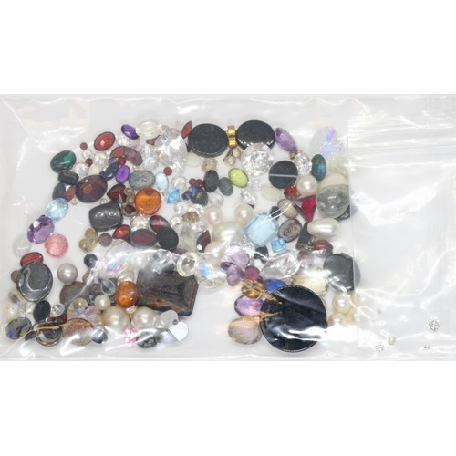 190 - A parcel of assorted gem stones including diamonds, man-made, beads, etc.