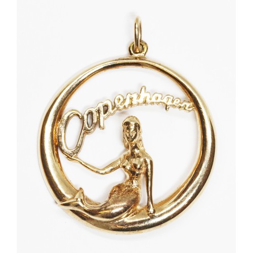 8 - A pendant formed as a a mermaid sat within a circle and holding sign 'Copenhagen', length 40mm, mark... 