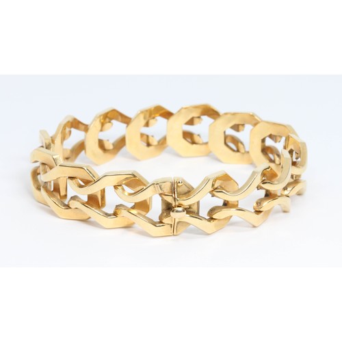 2 - A 1960s style linked bracelet, marked '750', length 19.5cm, weight 27.3g.