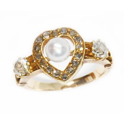 19 - An antique diamond and pearl ring, a central pearl surrounded by a heart shaped cluster of rose cut ... 