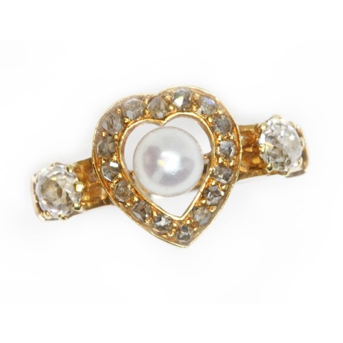 19 - An antique diamond and pearl ring, a central pearl surrounded by a heart shaped cluster of rose cut ... 