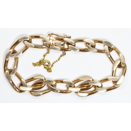 12 - A curb link bracelet, clasp indistinctly marked, length 8cm, weight 43.6g.