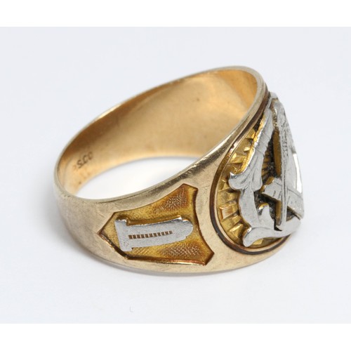 21 - A white and yellow metal Masonic signet ring, marked 'P.S.Co' and '10K', gross weight 7.1g, size U.