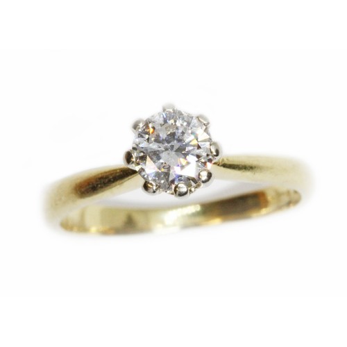 38 - A diamond solitaire ring, the round brilliant cut stone weighing approximately 0.50 carats, 18ct gol... 