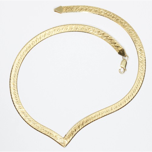 55 - A flat V necklace, length 46cm, marked '14kt', weight 25.3g.