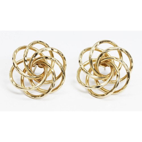 68 - A pair of knotted wire earrings, marked '14K', weight 2.9g.