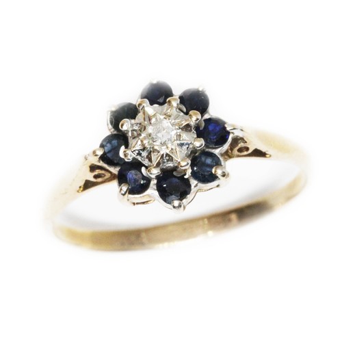 111 - A hallmarked 9ct gold diamond and sapphire cluster ring, gross weight 1.6g, size N.