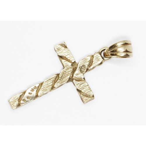 130 - A hallmarked 9ct gold cross, length 48mm (including bale), gross weight 8g.