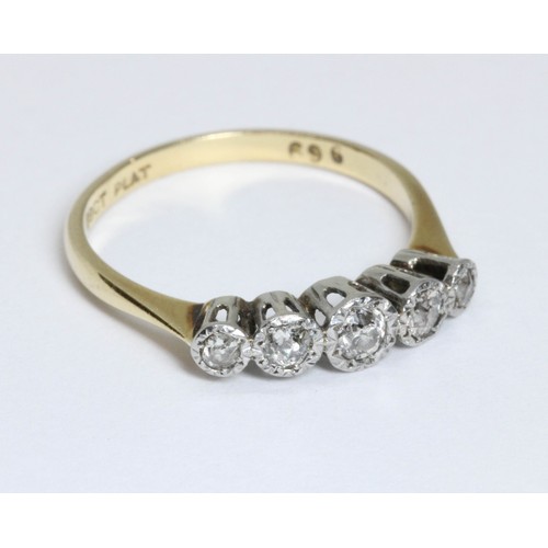 157 - A five stone diamond ring, the white metal bezel set old European cut stones weighing approximately ... 