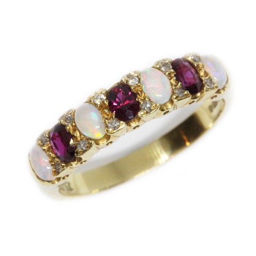 159 - An 18ct yellow gold multi-gem set half hoop ring, set with opals, rubies and diamonds, hallmarked; s... 