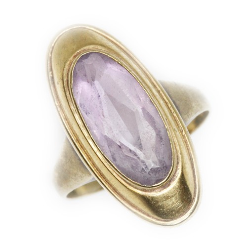 152 - An amethyst ring, the yellow metal band marked '9K', gross weight 3g, size O.