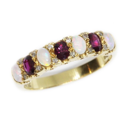 159 - An 18ct yellow gold multi-gem set half hoop ring, set with opals, rubies and diamonds, hallmarked; s... 