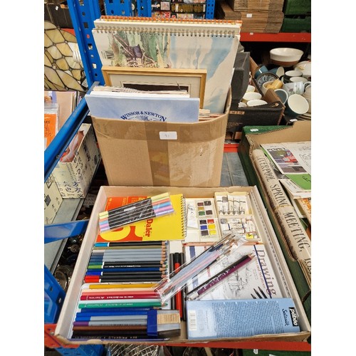 183 - Two boxes of artists materials including watercolour tubes and pans, watercolour pads, sable brushes... 