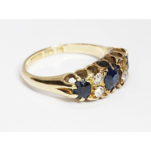 24 - A late Victorian sapphire and diamond ring, sponsor 'SU', Birmingham 1897, gross weight 2.8g, size E... 