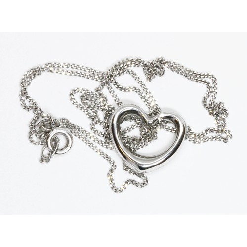 513 - A 9ct white gold heart shaped pendant on 44cm 9ct white gold chain, gross weight 1.9g.