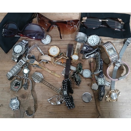 520 - A collection of assorted watches and sunglasses.