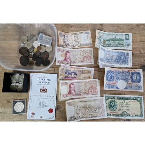 567 - A tub of assorted world coins & banknotes to include various Beatrix Potter 50ps, a silver proof £2 ... 