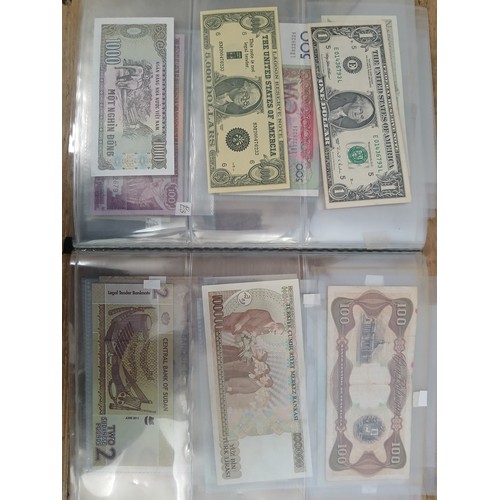 563 - A file of assorted world banknotes.