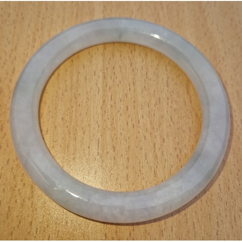 185 - A Chinese icy jadeite jade bangle, inner diameter 55mm, outer diameter 74mm, gross weight 44.4g.